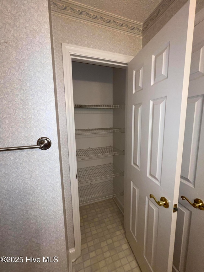 5f guest bath- lower linen