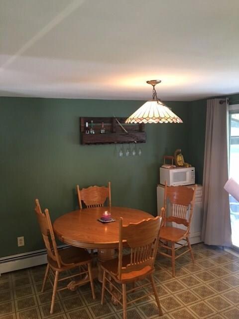 Dining area with a door to the...