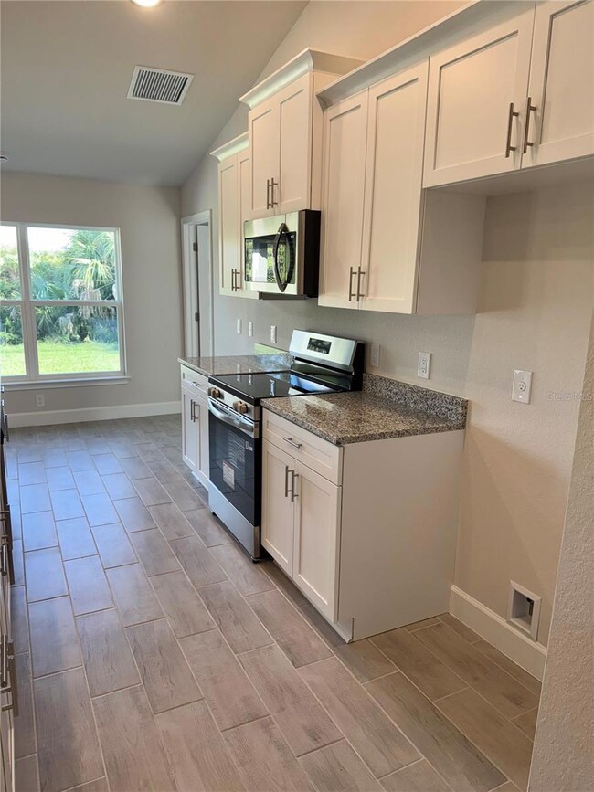 9527 Impala Cir, Port Charlotte, FL 33981 - photo 6