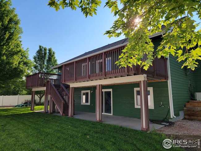 Back of home faces West. Covered patio is the length of the back of the home.
