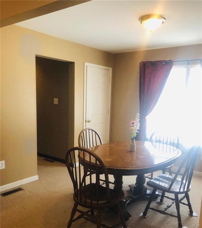 Dining room with picture window.