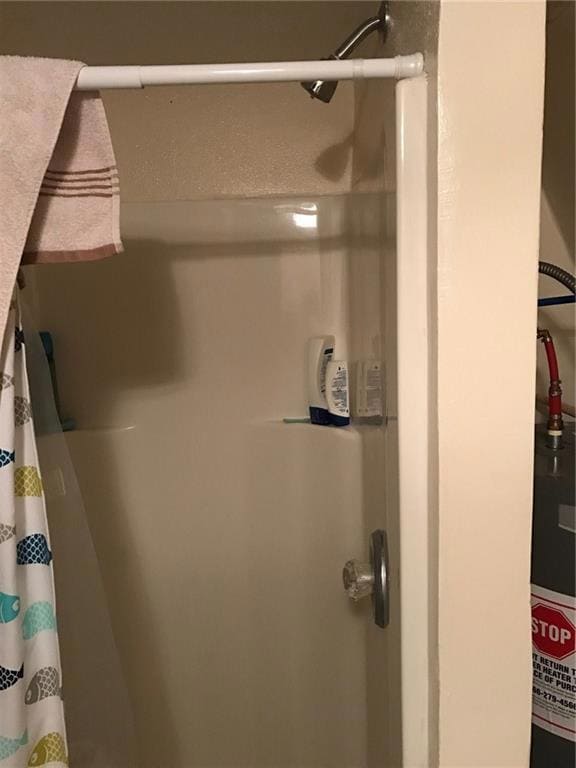 shower . Is behind the door in the previous pictur