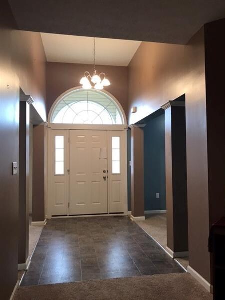 Grand Foyer - Arched Window and High Ceilings