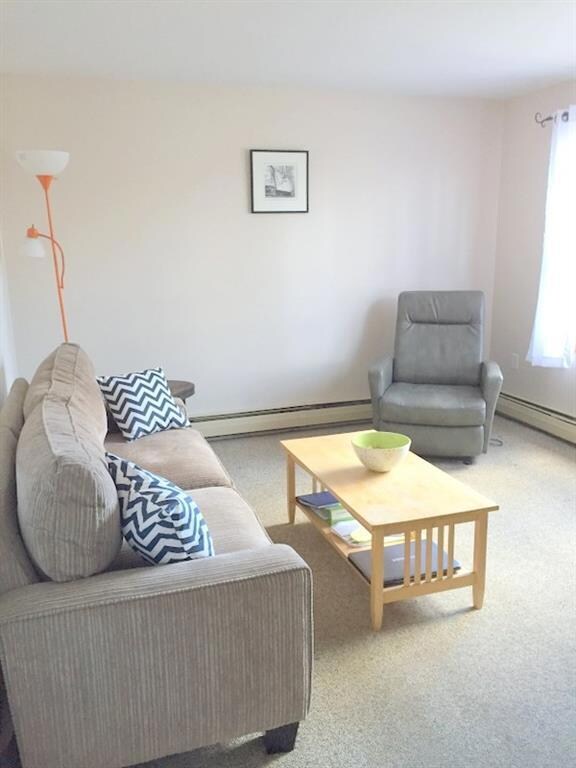 Living room with windows onto the...