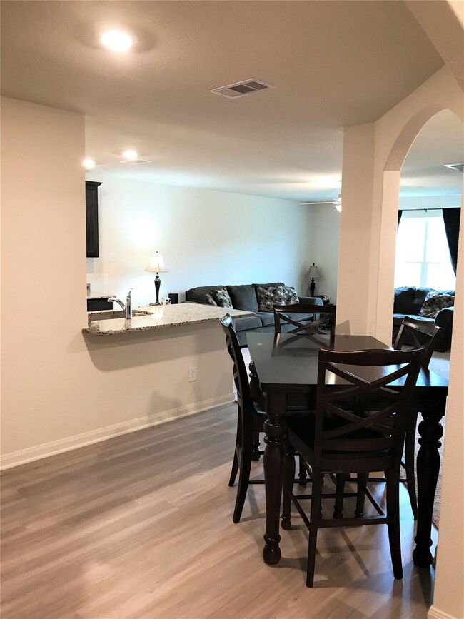 Dining area is right off the kitchen and open to the family room!
