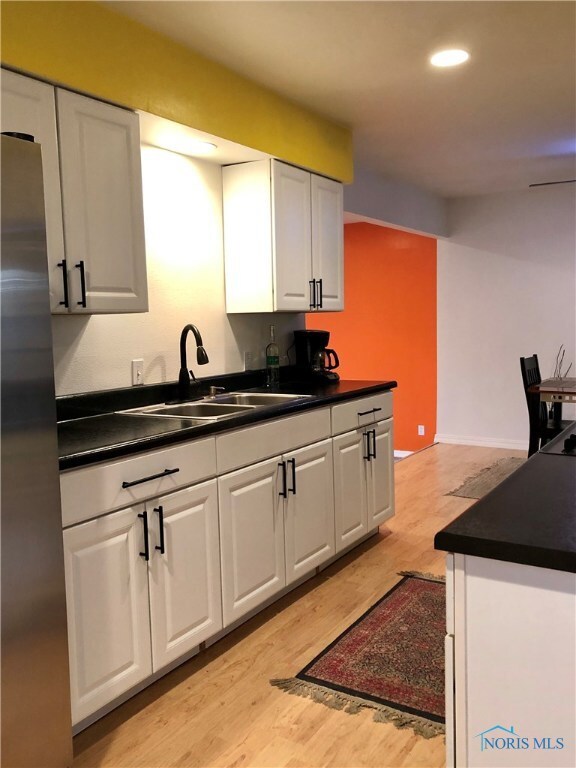 Kitchen with stainless steel appliances.
