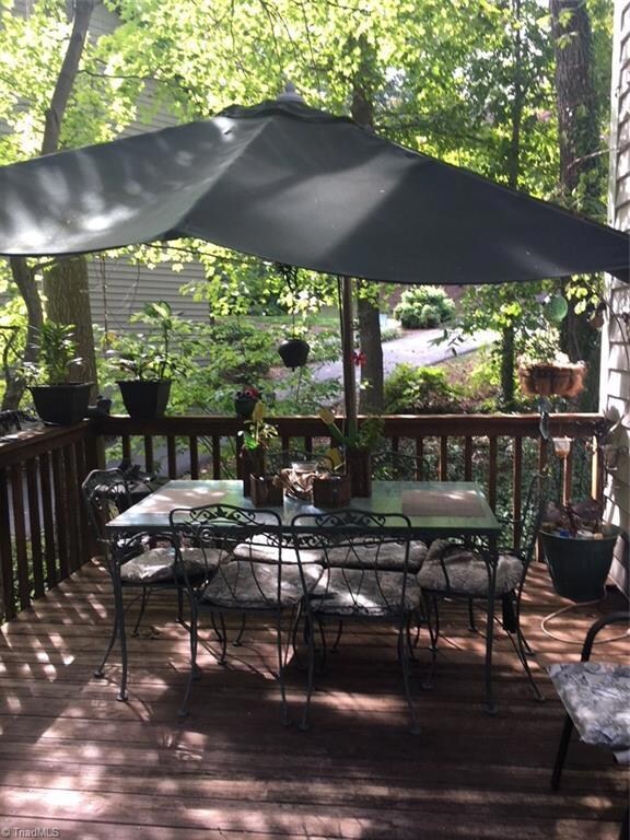 You'll love summer cookouts on this shady deck.