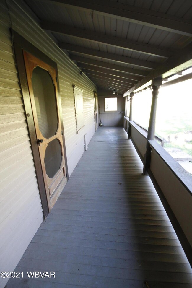 porch and entry to 2nd floor apartment