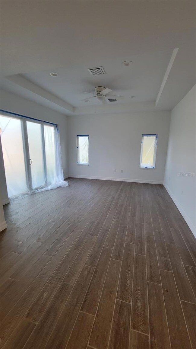 Open Living Dining area with tray ceiling
