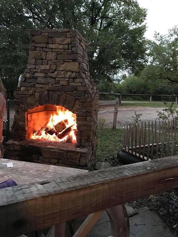 Cozy outdoor fireplace.