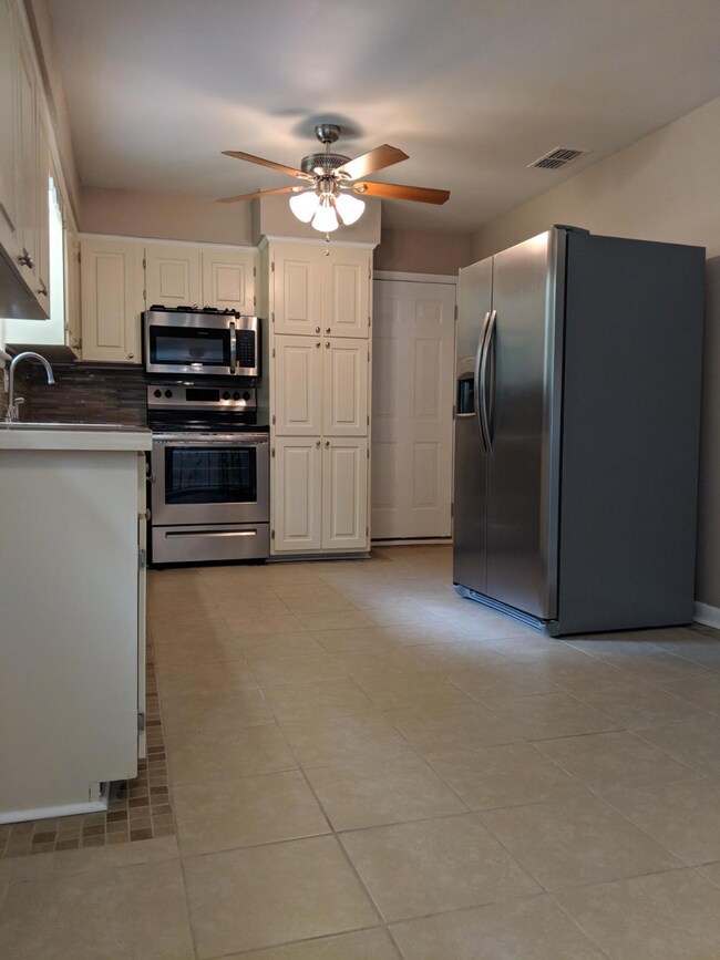 Kitchen has new appliances.
