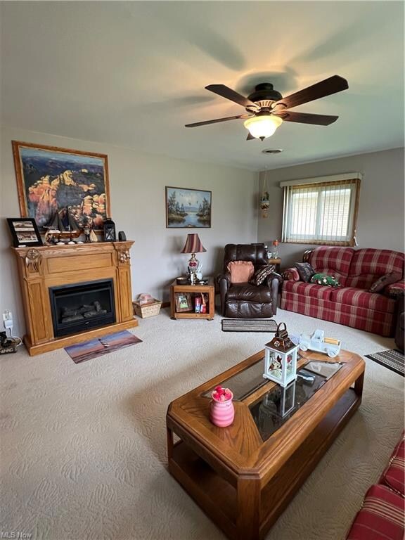 Living room 19 x 15 with ceiling fan.
