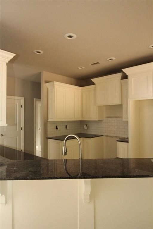 Granite countertops. Lots of cabinets!