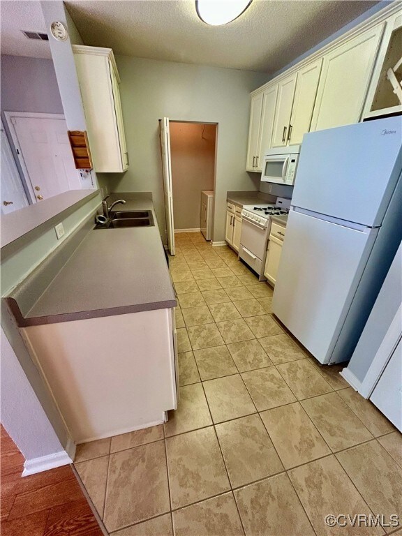 Kitchen with microwave, D/W, refrigerator