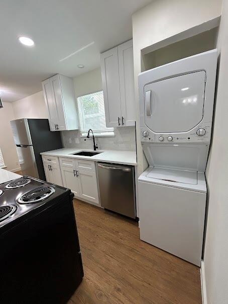 Kitchen featuring stainless steel appliances, sta