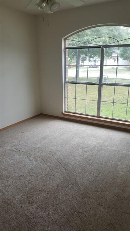 Bedroom 2: Loads of Natural lighting, brand new carpet, and great storage space