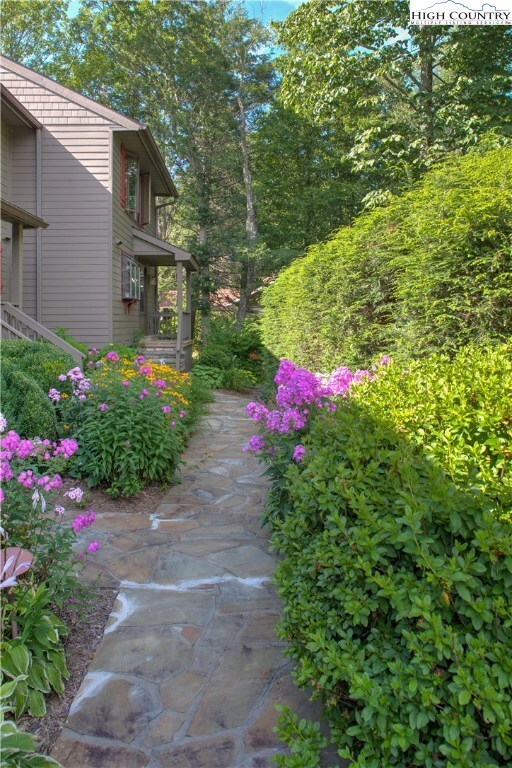 A beautifully landscaped stone pathway to your new