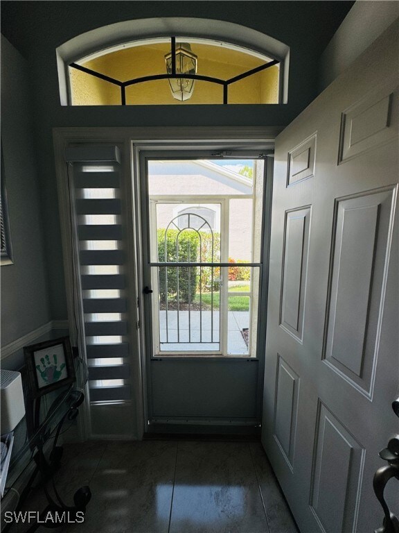 Doorway to outside with plenty of natural light an