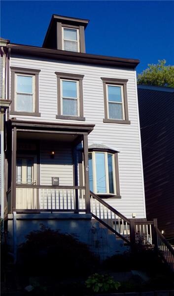 Beautifully renovated row house. Convenient to eve