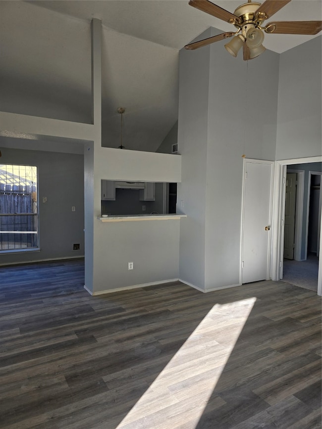 Sunlight is Shining in on your New Investment!! Spacious Living Room w updated Flooring and Paint throughout!