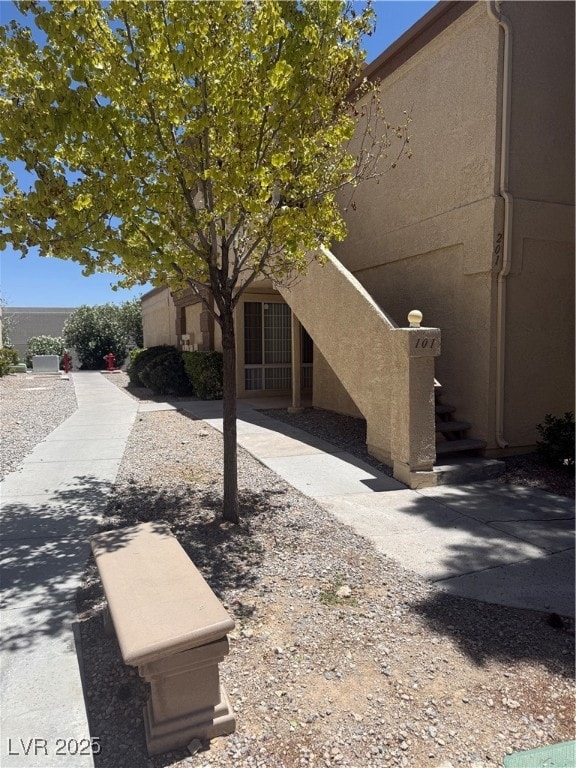 View of property exterior featuring stucco siding