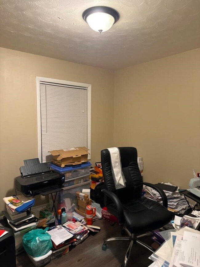 Office featuring hardwood / wood-style flooring