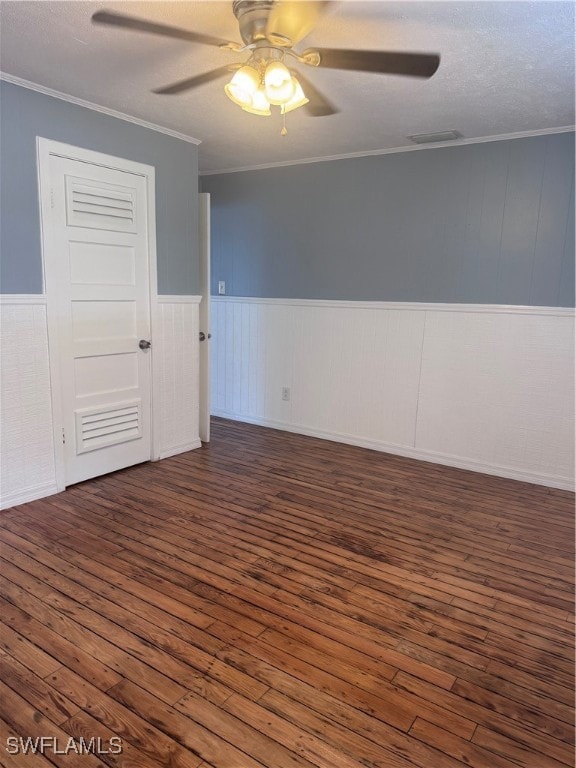 Spare room featuring hardwood / wood-style floors,
