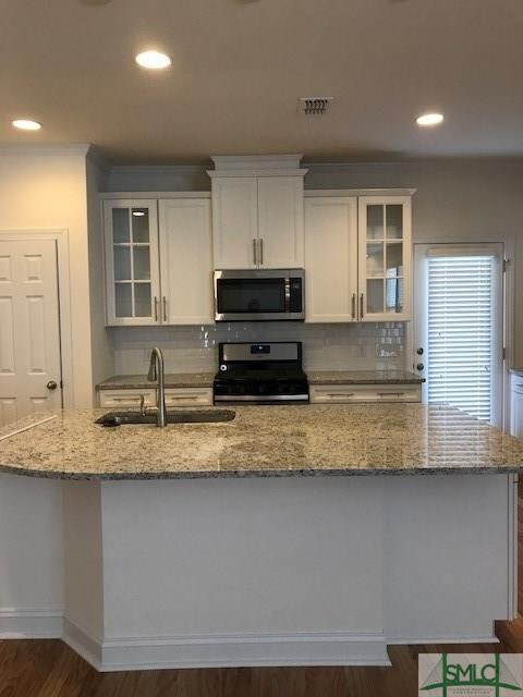 Photos are not of actual home.