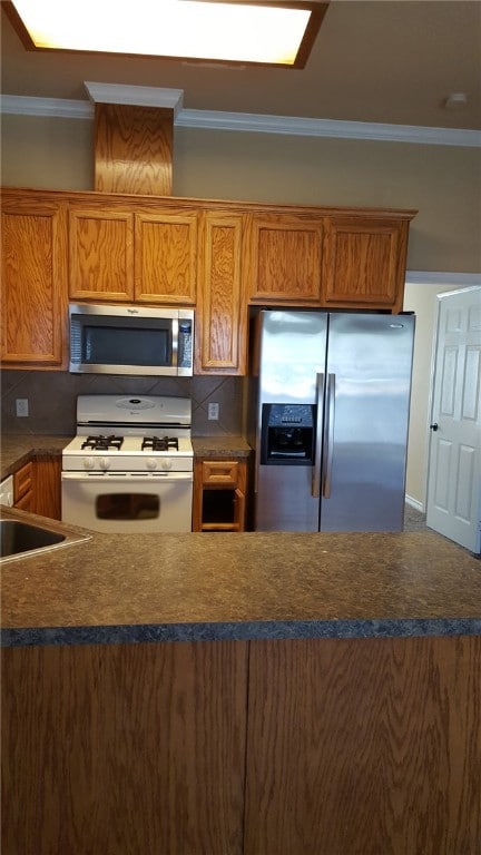 Kitchen featuring appliances with stainless steel