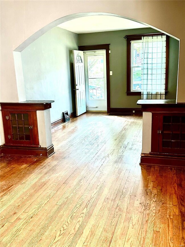 Dining Room view to Living Room with built in book