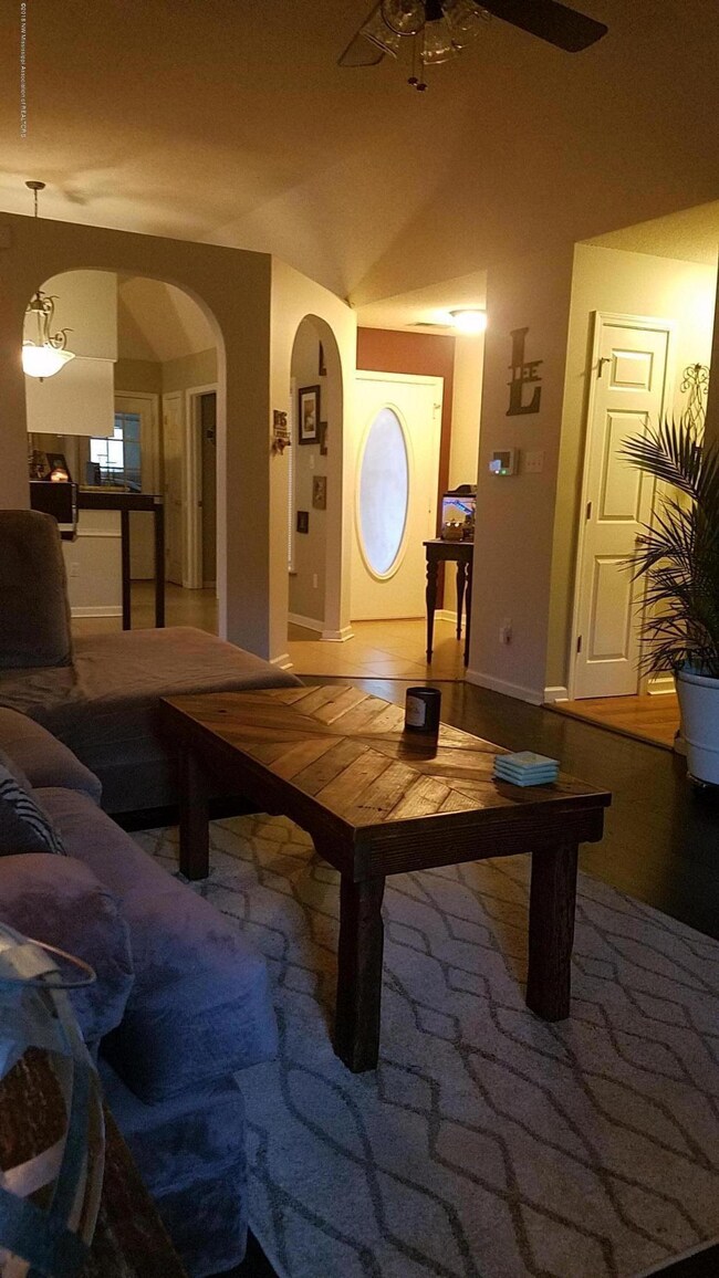 LIVING ROOM LOOKING INTO DINING ROOM