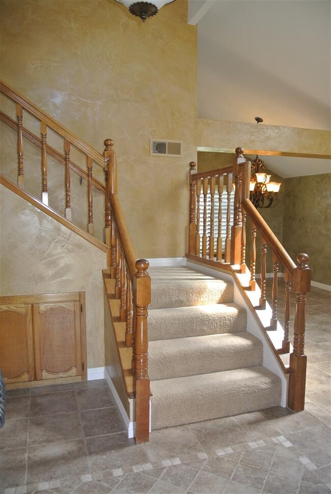 Custom tile entry with extra storage under the sta