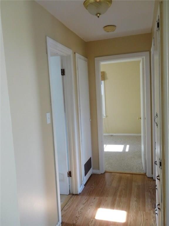 Space layout, door to left full bath , in front 1 bedroom and to right second bedroom