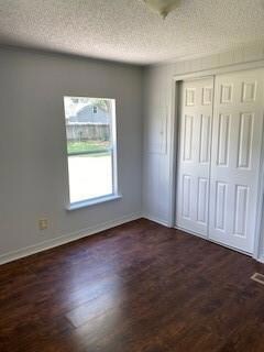 FRONT LEFT BEDROOM, LAMINATE WOOD FLOORS