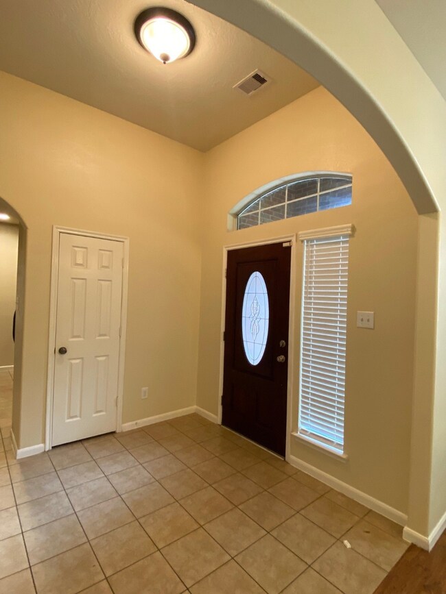 Front entrance with coat closet
