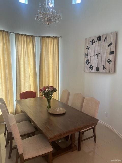 Dining area featuring tall oversized windows