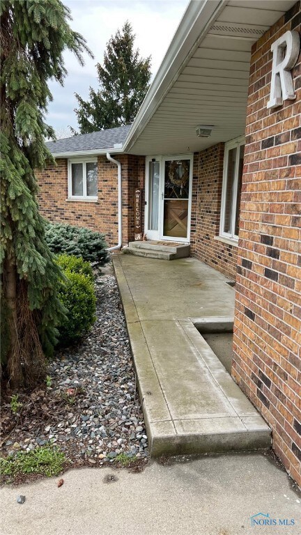 Front entry off driveway