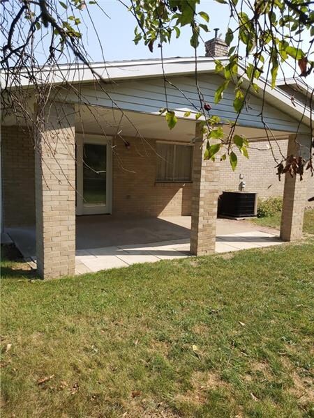 from hillside looking onto rear porch