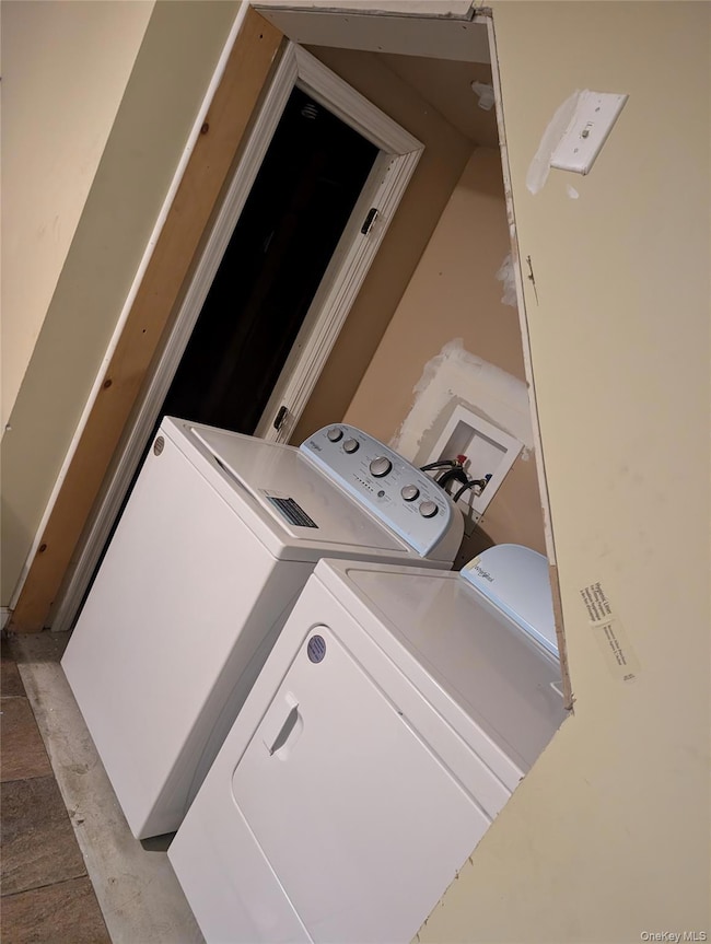 Laundry room featuring washer and dryer