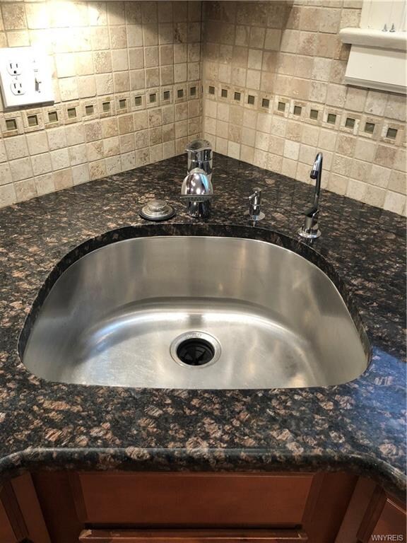 Granite countertops and on demand filtered water t