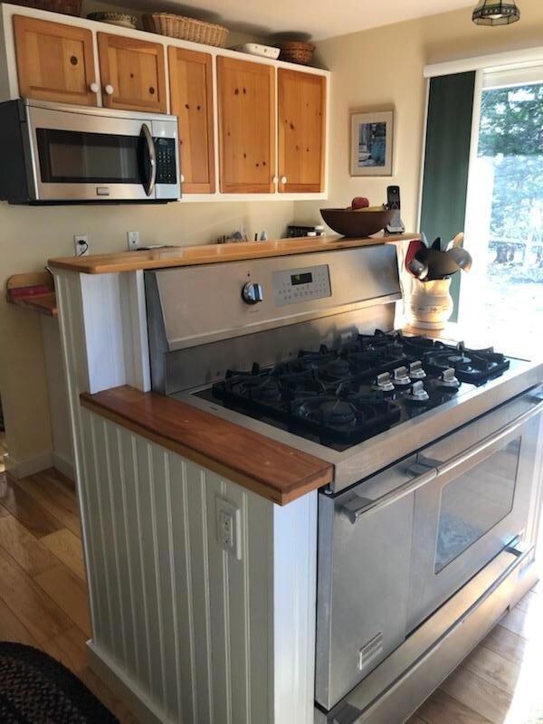 Kitchen also has doors to deck