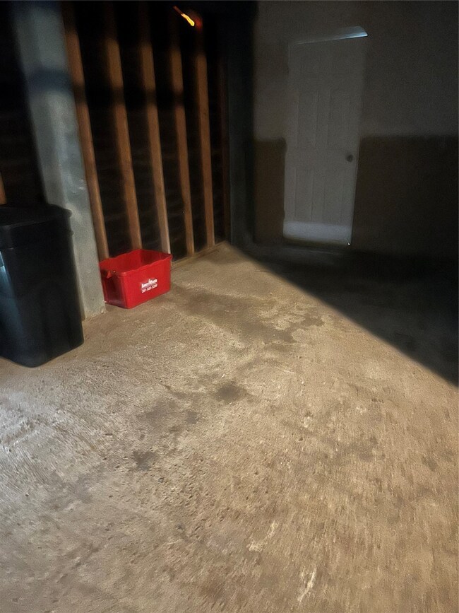 One car garage and door to efficiency bathroom