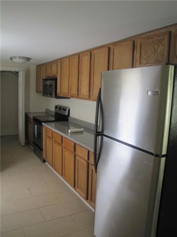 Kitchen offers loads of cabinets and check out these appliances!!