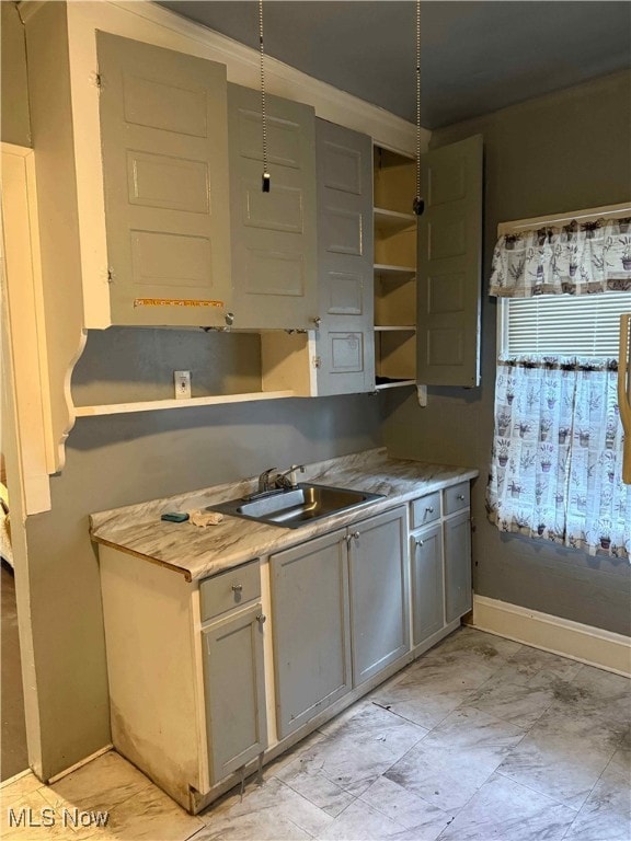 Kitchen with light countertops and open shelves