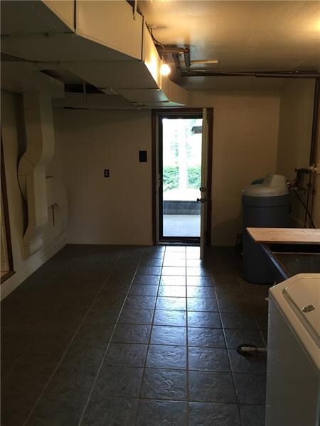 Large Mudroom with Ceramic Tile floor