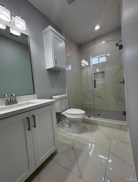 Full bathroom featuring toilet, marble look tiles, a marble finish shower, vanity, and recessed lighting