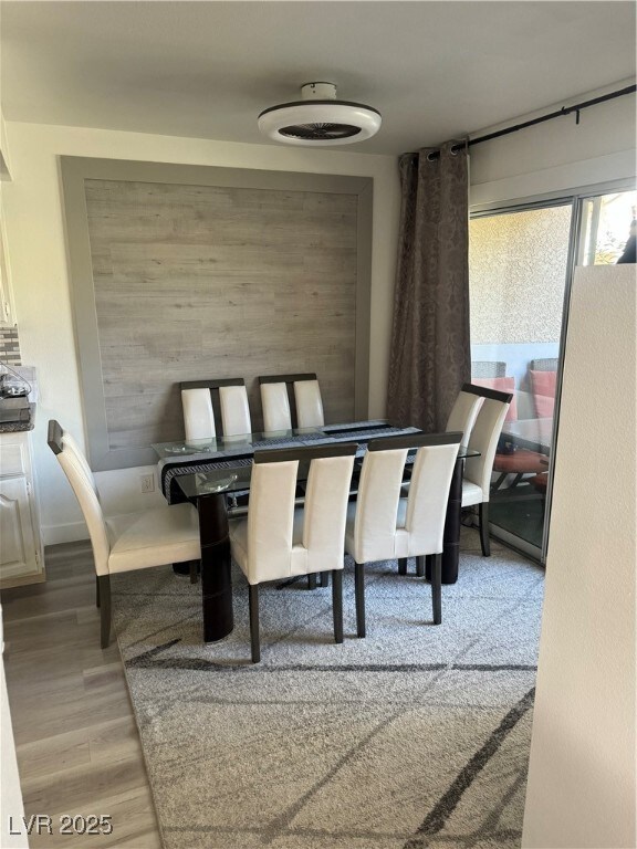 Dining area featuring light wood-type flooring