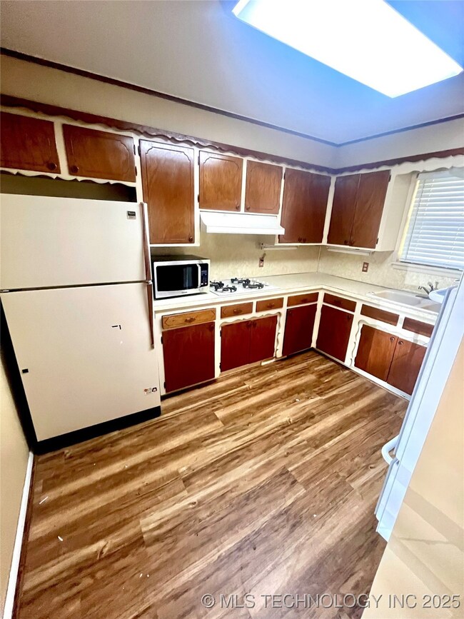 Kitchen with refrigerator

