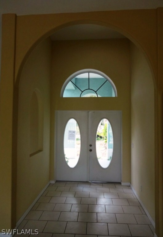 Foyer with double door entry