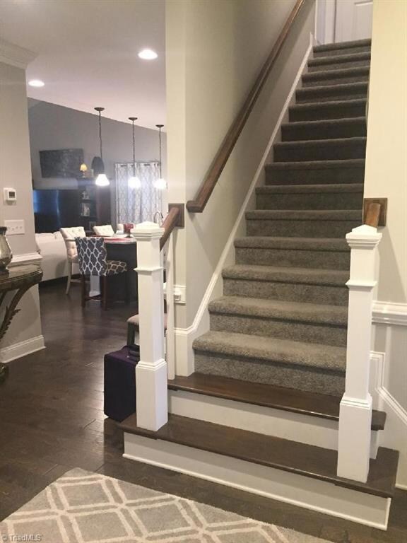 Stairs lead to Huge Bonus Room & Walk-in Attic